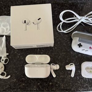 Apple Airpods Pro with accessories